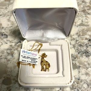 Gold giraffe pendant